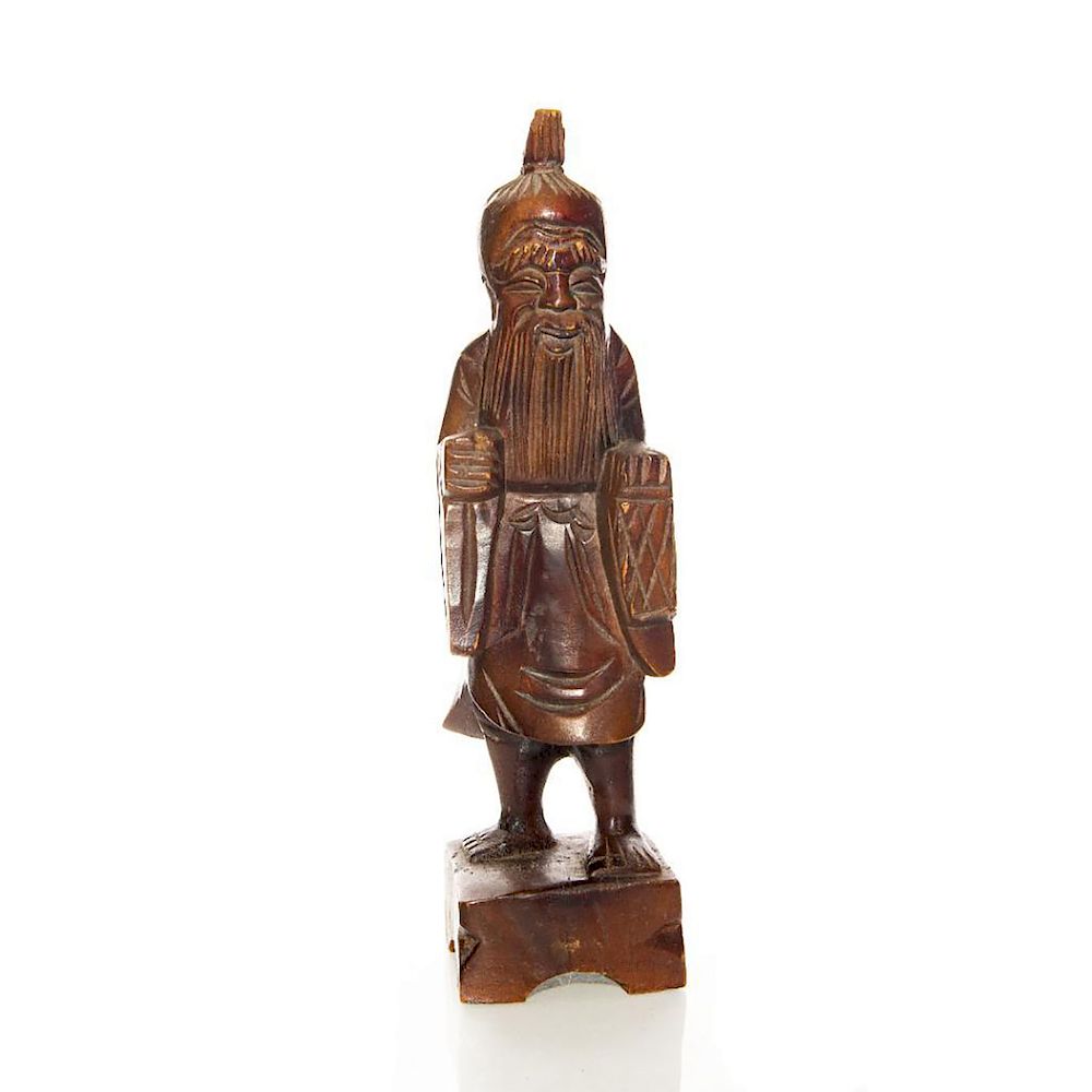 Appraisal: HAND CARVED TRADITIONAL CHINESE WOOD CARVING Elderly man smiling Issued