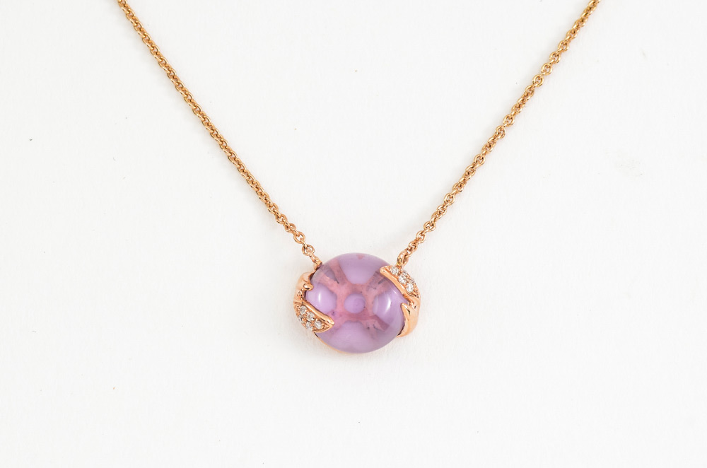 Appraisal: CABOCHON AMETHYST DIAMOND NECKLACE k rose gold pendant and chain