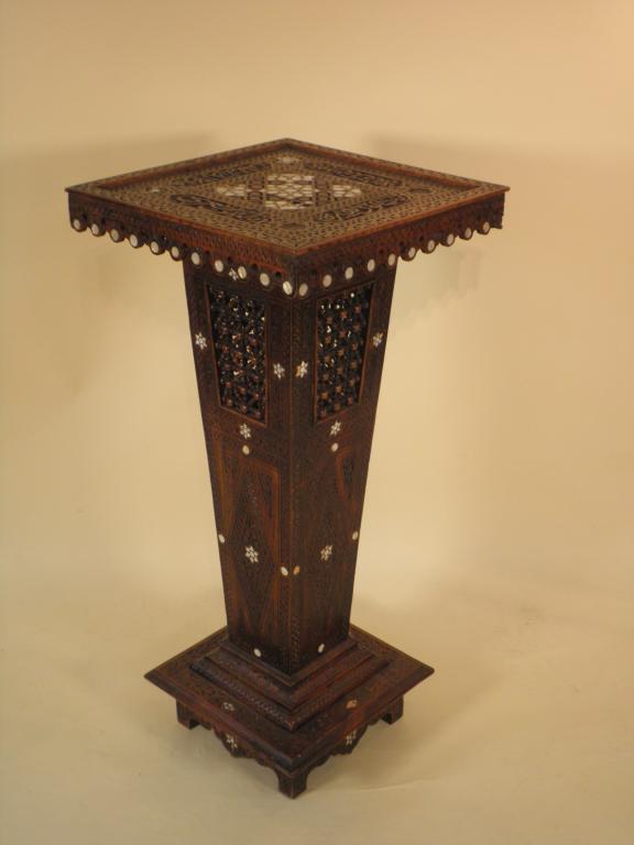 Appraisal: A late thC mahogany torchere carved and inlaid in bone