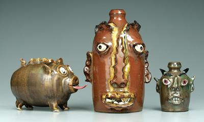 Appraisal: Two Marvin Bailey face jugs pig face jug with broken