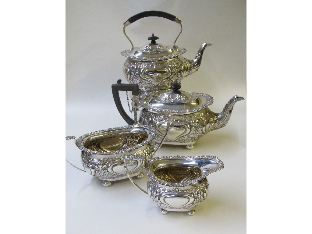 Appraisal: An Edwardian silver four piece tea service embossed with flowers