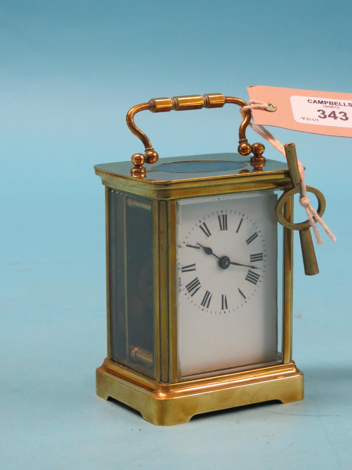 Appraisal: A French brass carriage clock with enamelled dial and timepiece