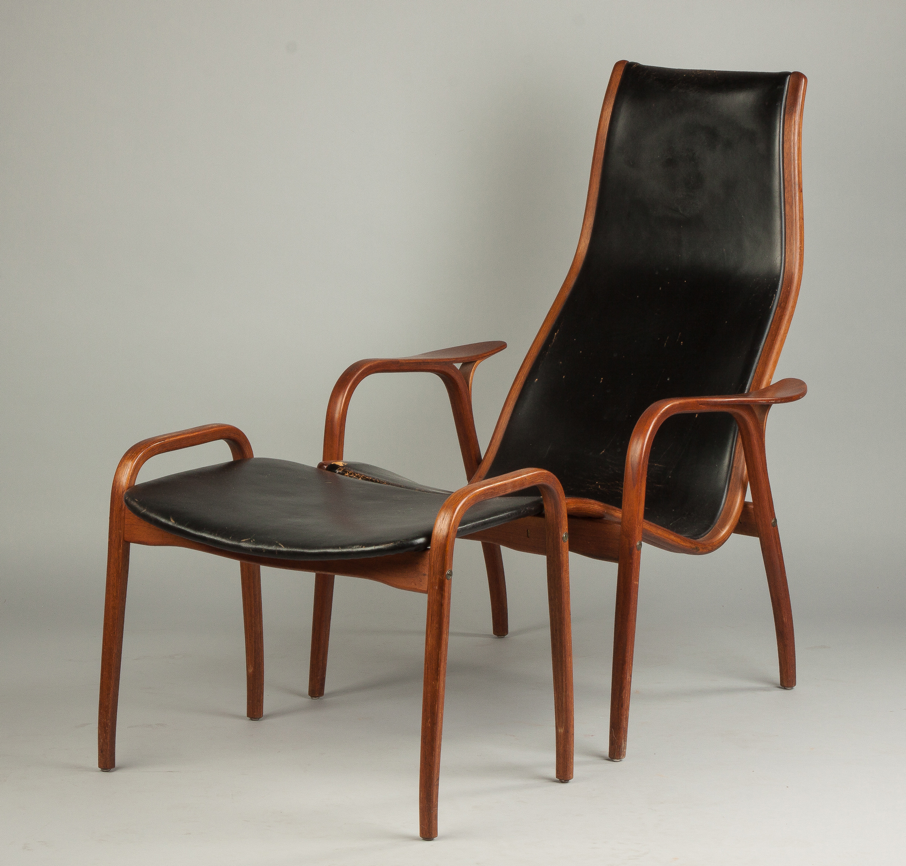 Appraisal: Yngve Ekstro m Lamino Chair and Ottoman for Swedese Mobler