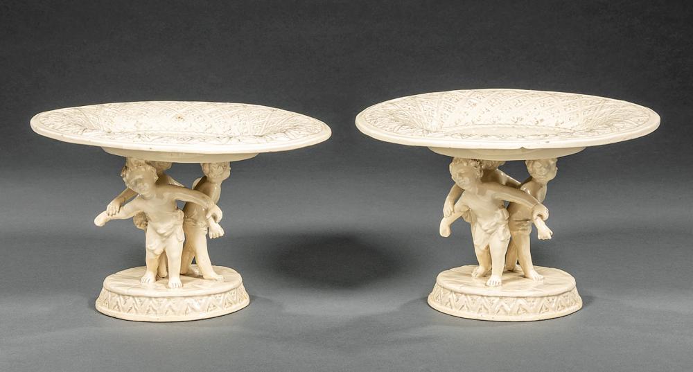 Appraisal: Pair of Continental Blanc de Chine Figural Tazzas unmarked stand