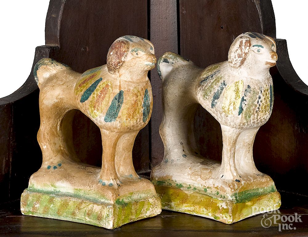 Appraisal: Pair of Pennsylvania chalkware spaniels Pair of Pennsylvania chalkware spaniels