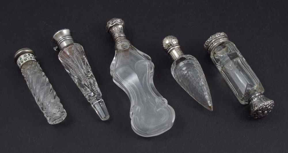 Appraisal: GROUP OF STERLING MOUNTED CRYSTAL SCENT BOTTLES Divided bottle hinged