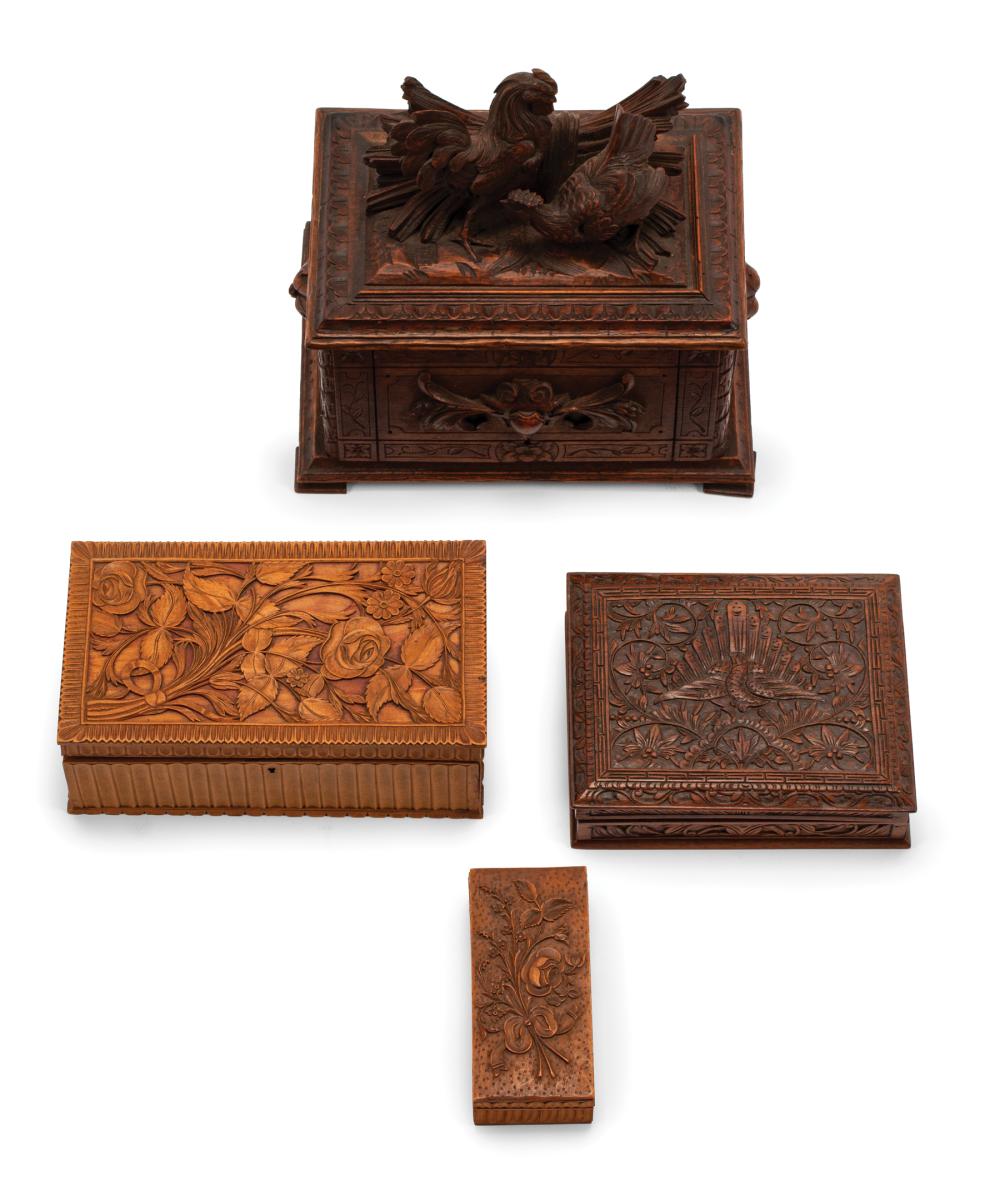 Appraisal: Four Continental Carved Wood Boxes th c incl humidor with