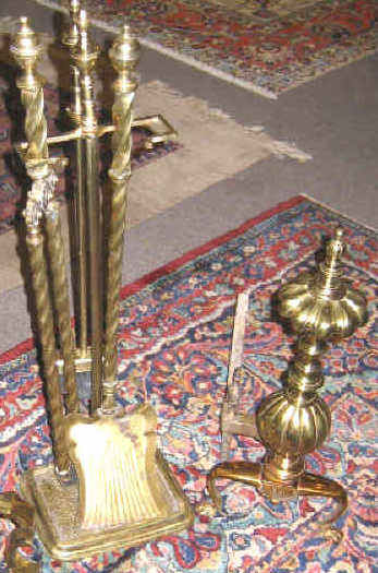 Appraisal: BRASS FIREPLACE GARNITURE Andirons and tools the andirons of gourd