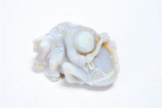 Appraisal: CARVED OPAL Chinese th century Large single opal carved in