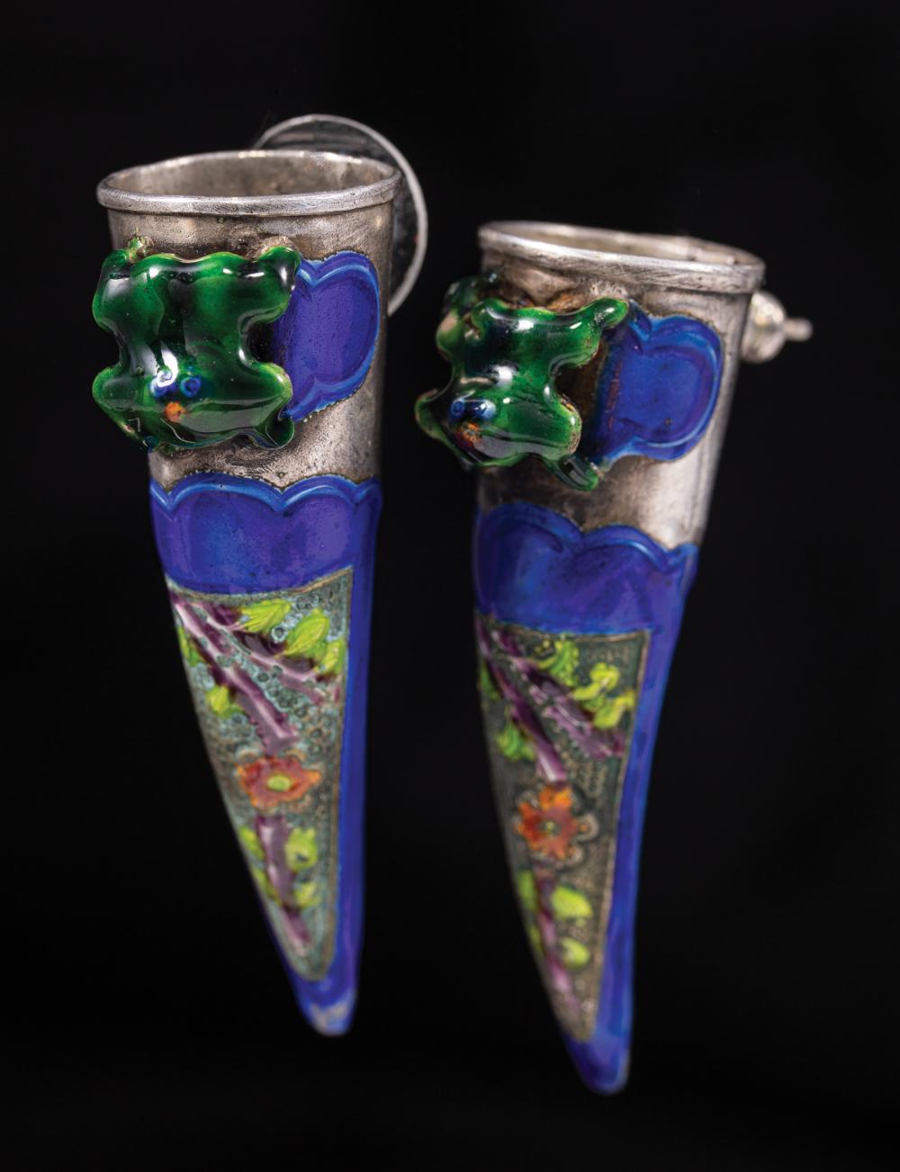 Appraisal: Pair of Chinese Silver and Enamel Finger Guards now set