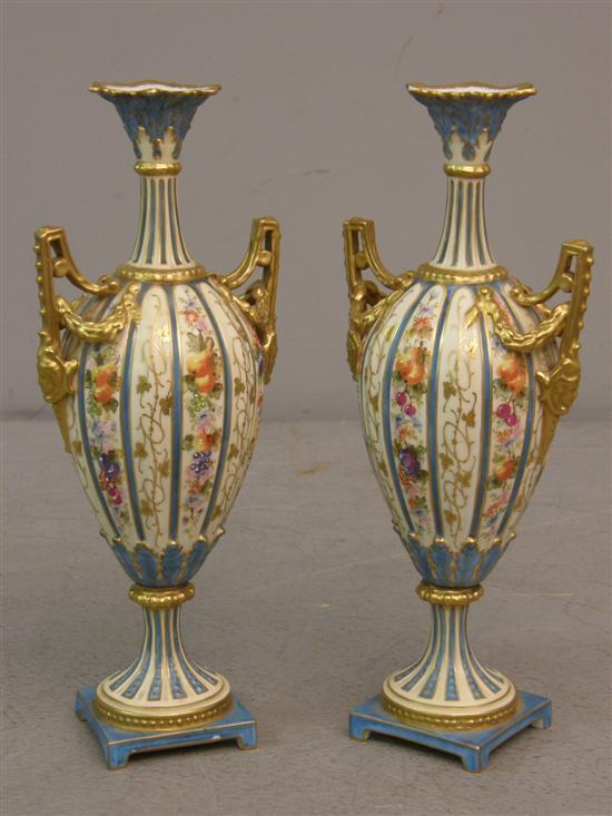 Appraisal: Pair of German porcelain hand painted vases transfer mark to