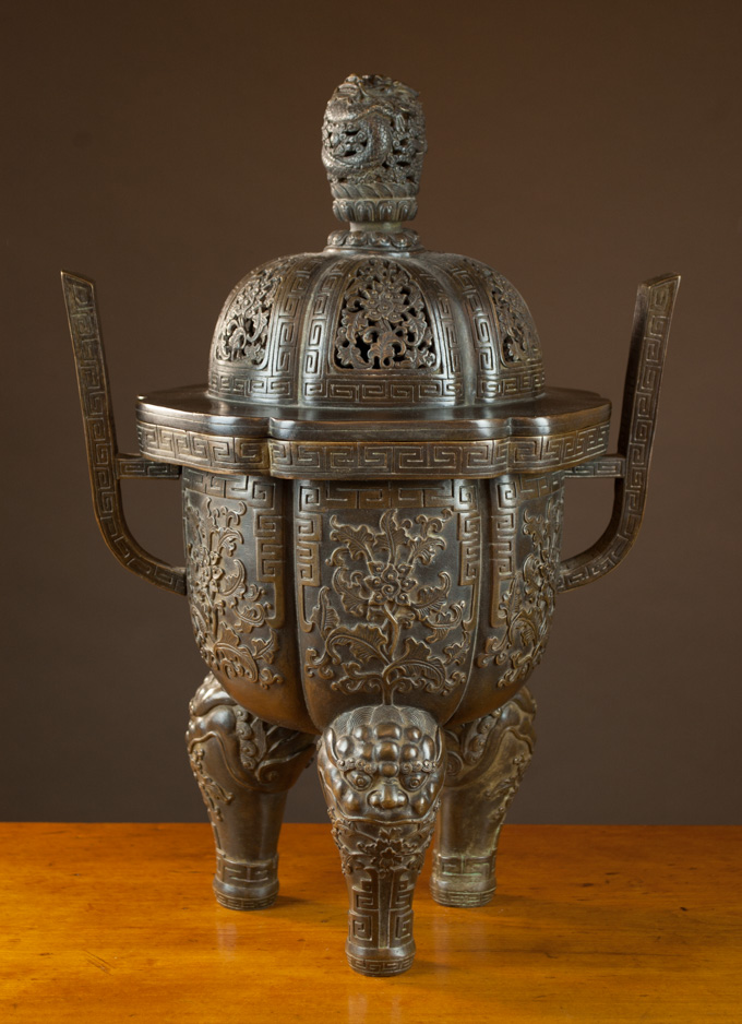 Appraisal: CHINESE BRONZE CENSER having stylized foliage relief panels on six