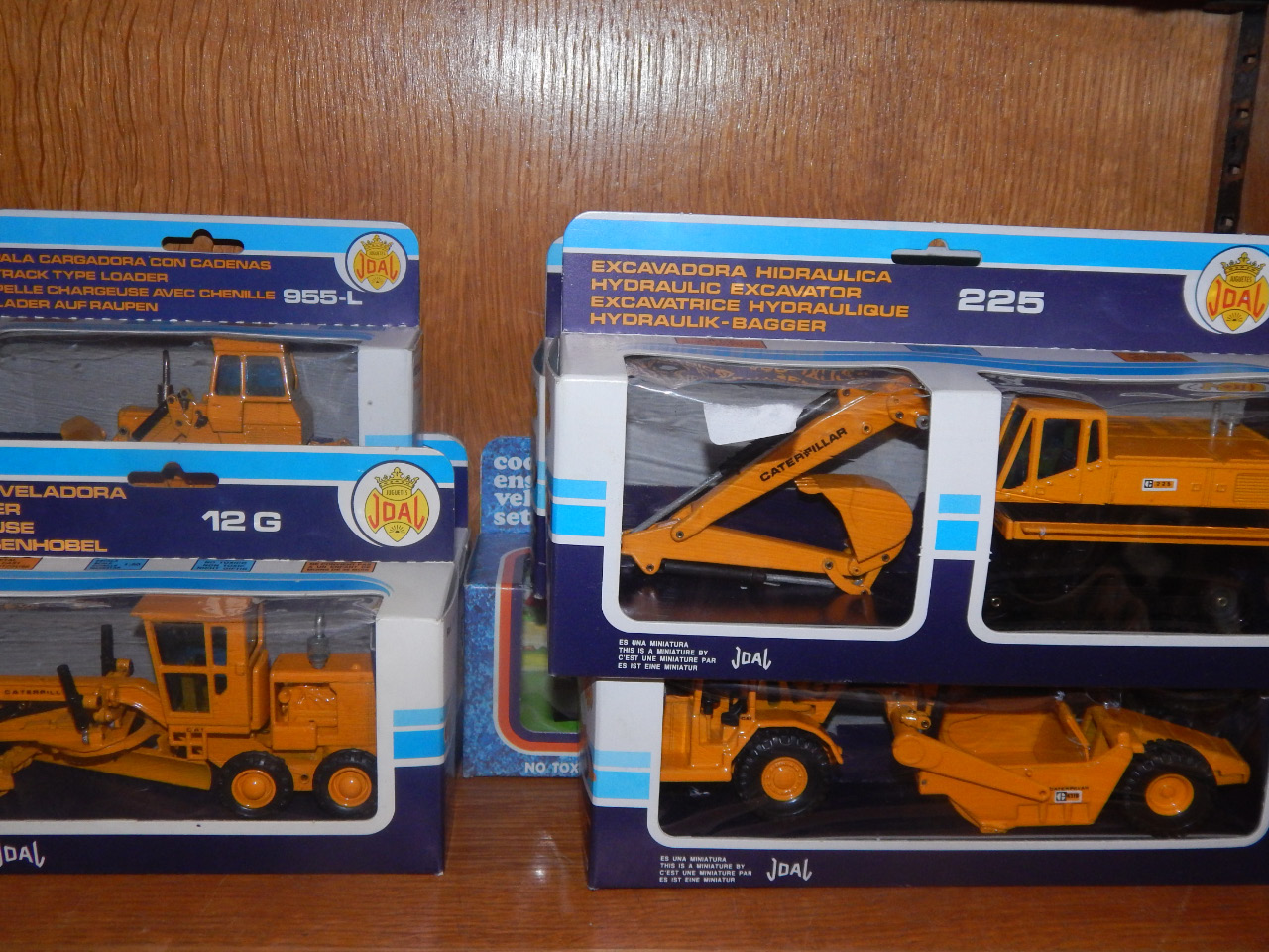 Appraisal: Joal die cast models comprising chain tractor Track Type loader