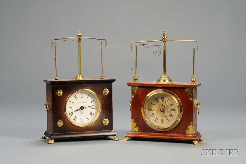 Appraisal: Two Ignatz Torsion Pendulum Clocks Jerome Company New Haven and