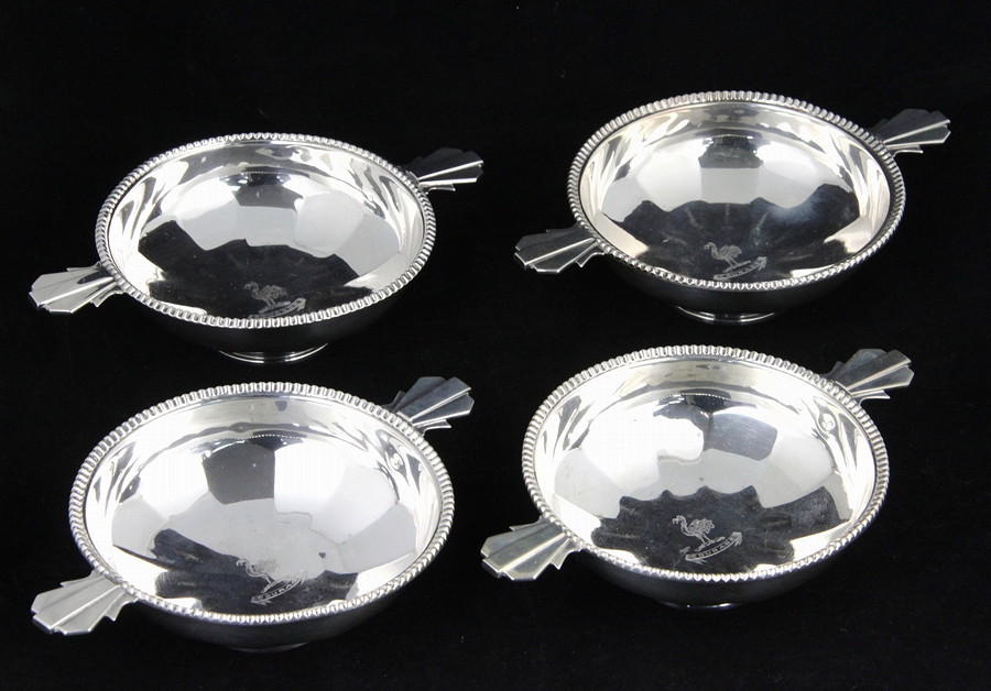 Appraisal: Four silver twin-handled dishes Mappin Webb Birmingham each with central