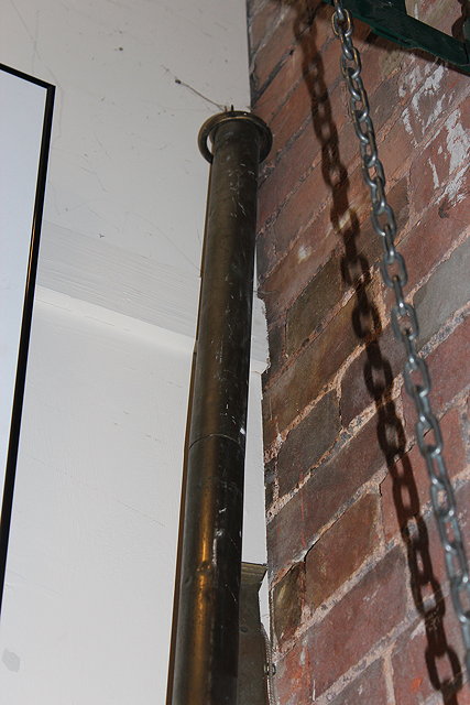 Appraisal: AN OLD BRASS CURTAIN POLE with rings cm long