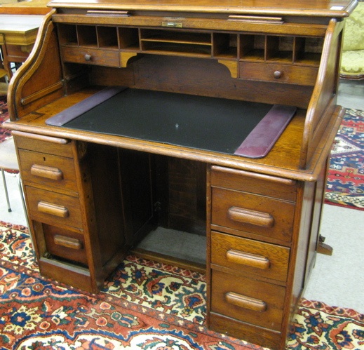 Appraisal: AN OAK ROLL TOP DESK American late th early th