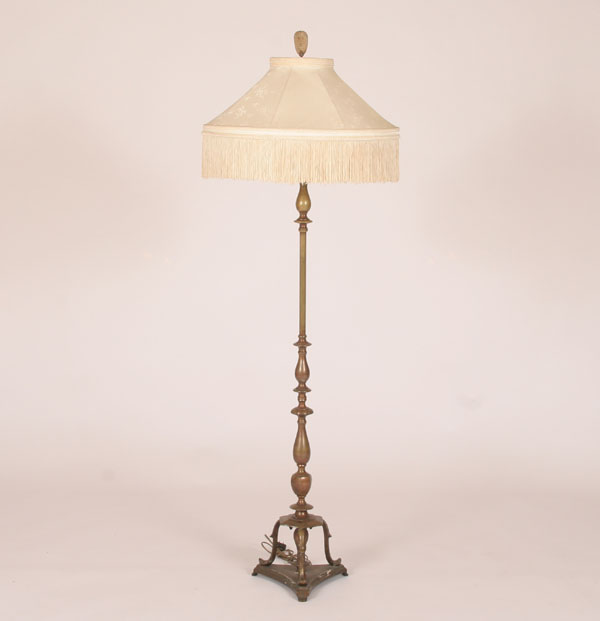 Appraisal: Bronze floor lamp with carved soapstone finial shaped floriform legs