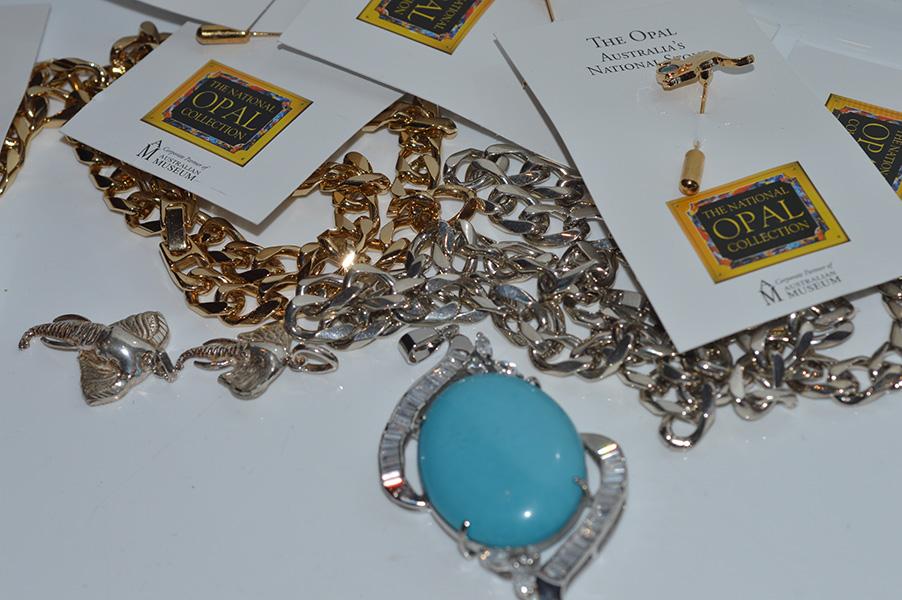 Appraisal: A COLLECTION OF KANGAROO AND OPAL BROOCHES GOLD NUGGET NECKLACES