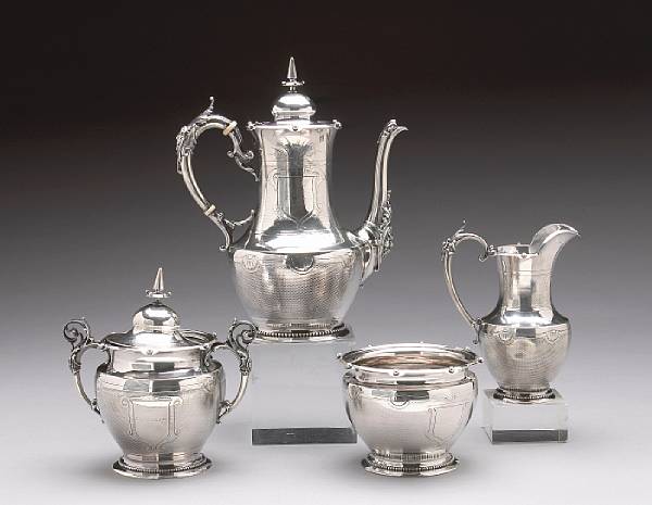 Appraisal: A coin silver four piece tea set with presentation inscriptionGorham