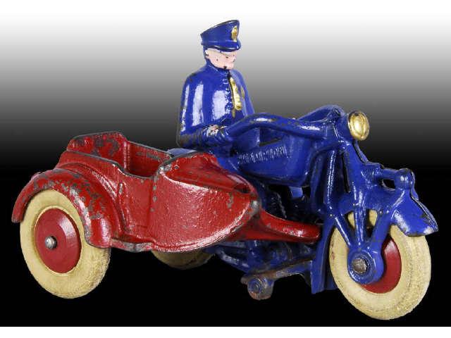 Appraisal: Cast Iron Champion Motorcycle Cop With Side Car Description Circa