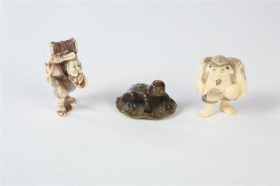 Appraisal: THREE NETSUKES Japanese th century Two ivory figures Ebisu and