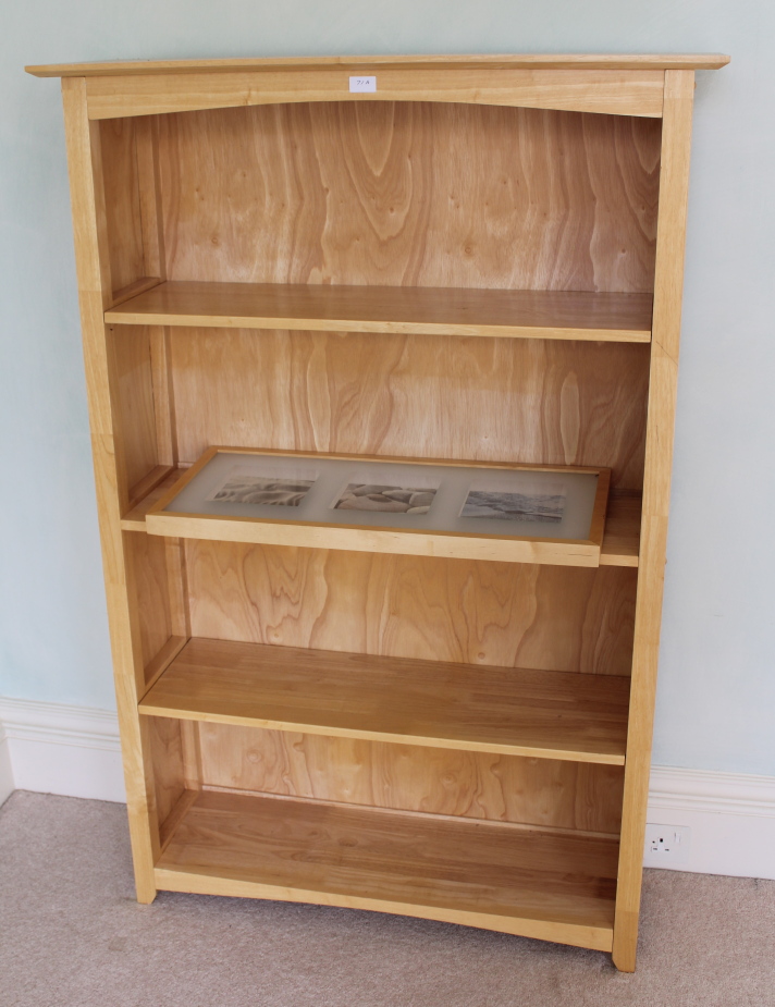 Appraisal: An open bookcase of four shelves and a picture