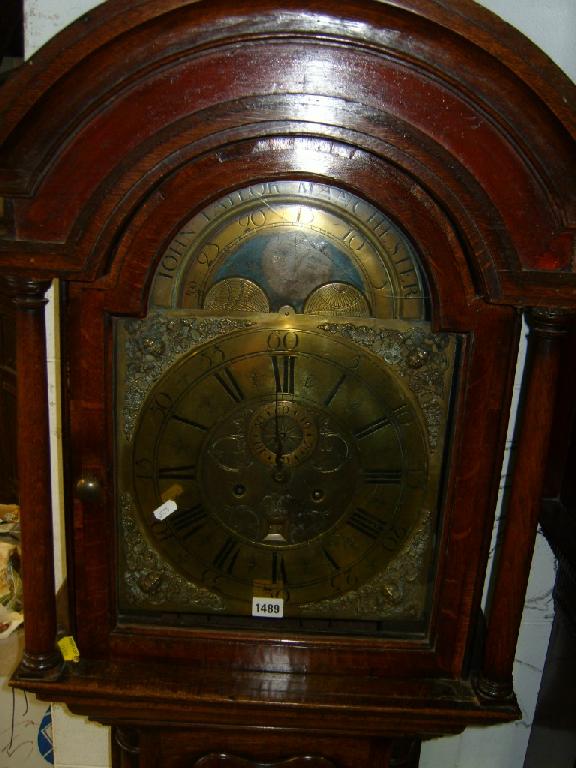 Appraisal: A Georgian oak longcase clock the full length door cross