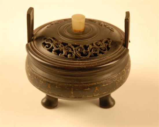 Appraisal: A th C Chinese Bronze Censer jade finial on openwork