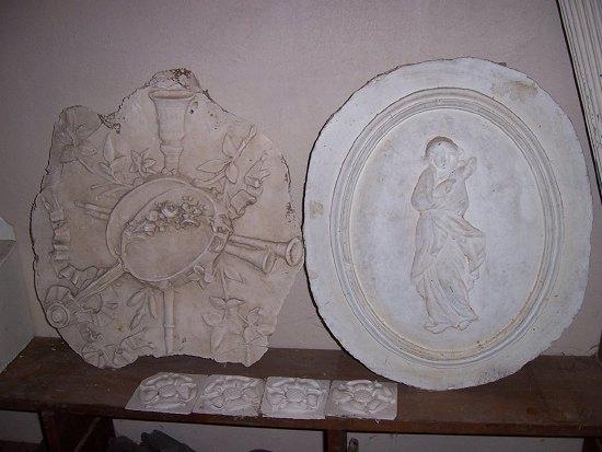 Appraisal: An oval relief panel moulded a portrait of a woman