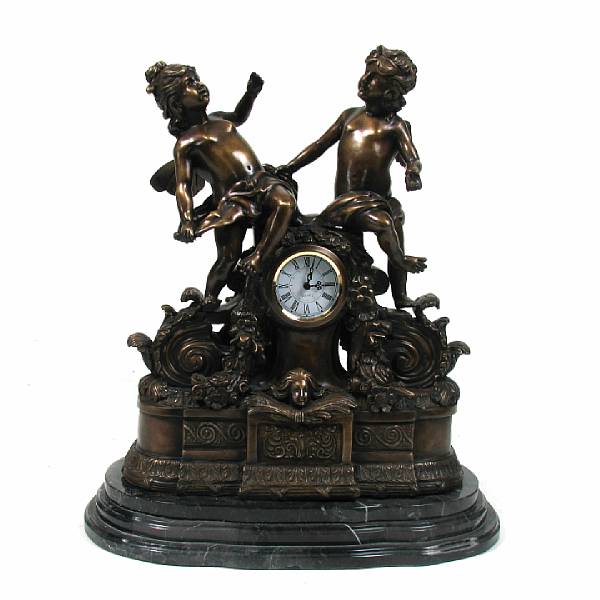 Appraisal: A patinated bronze and marble figural mantel clock incorporating a