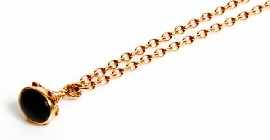 Appraisal: A ct rose gold chain with a ct gold black