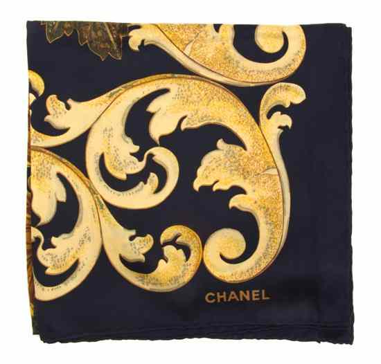 Appraisal: A Chanel Silk Scarf in a sunflower motif Labeled within