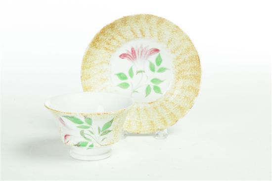 Appraisal: SPATTERWARE HANDLELESS CUP AND SAUCER England nd quarter- th century