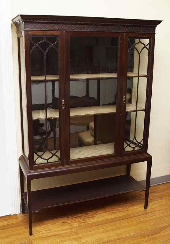 Appraisal: VICTORIAN MAHOGANY CHINA DISPLAY CABINET Molded crown over quarter width