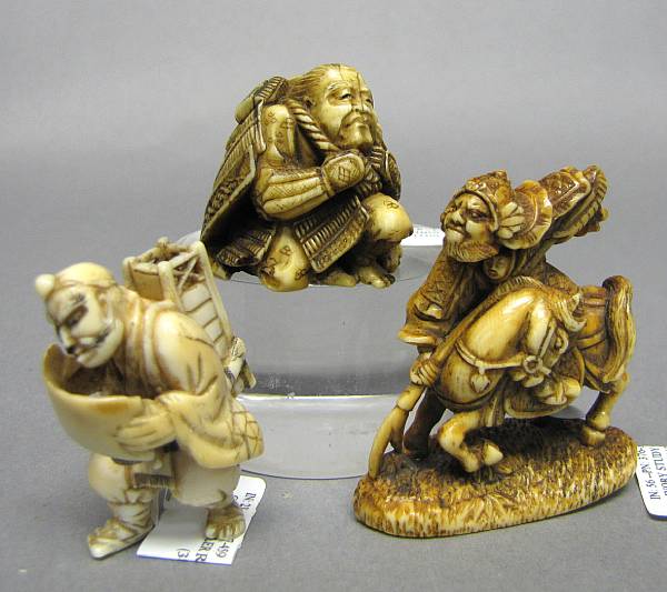 Appraisal: A group of three ivory figural netsuke th th Century