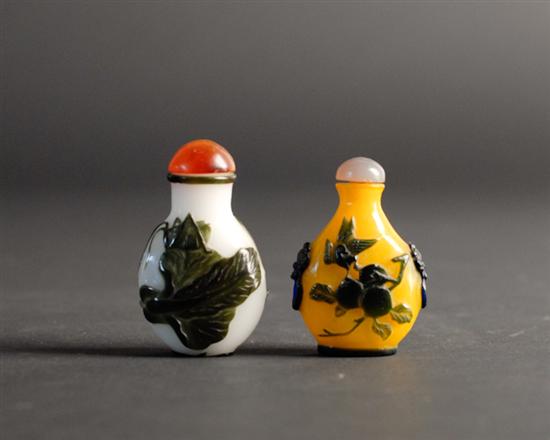 Appraisal: Two Cameo Cut Snuff Bottles both pear shapes a dark