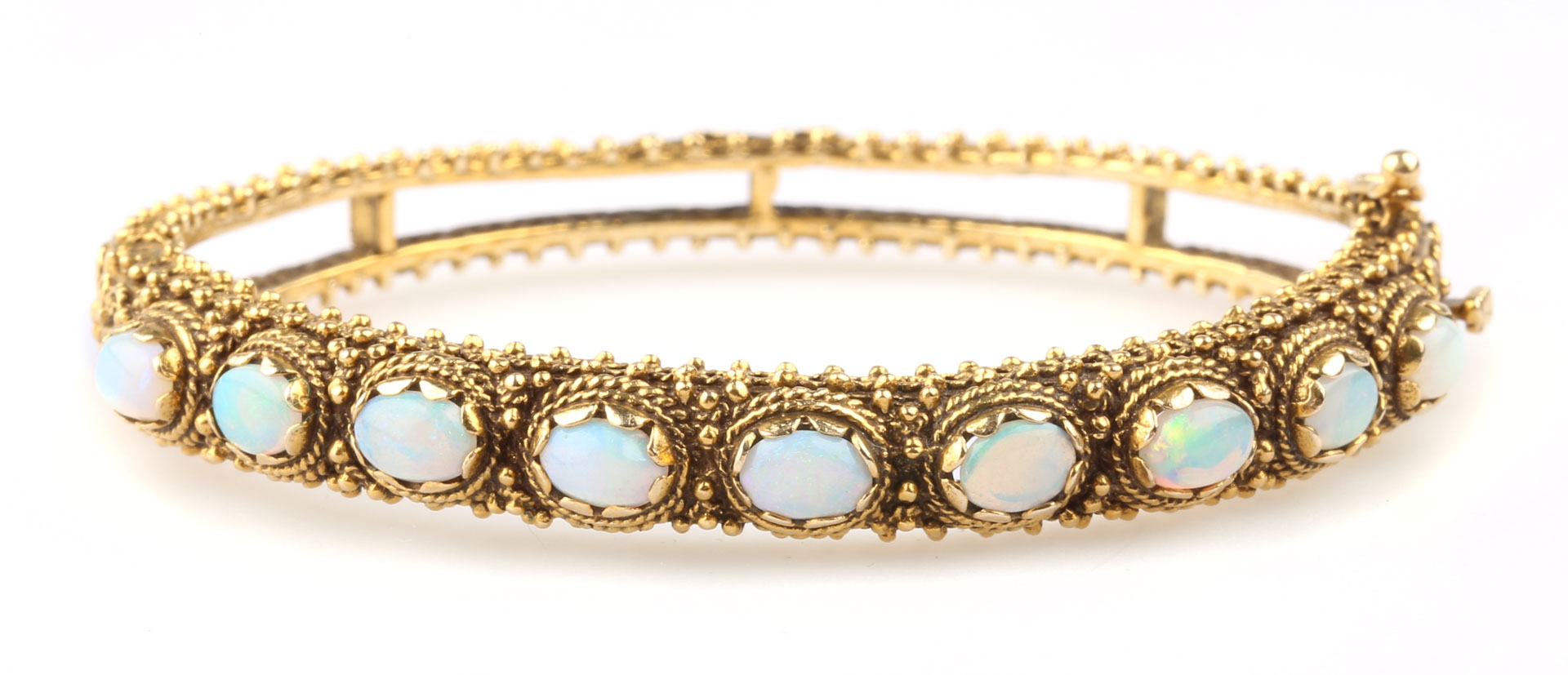 Appraisal: An Opal Bangle Bracelet K gold bracelet with great detail