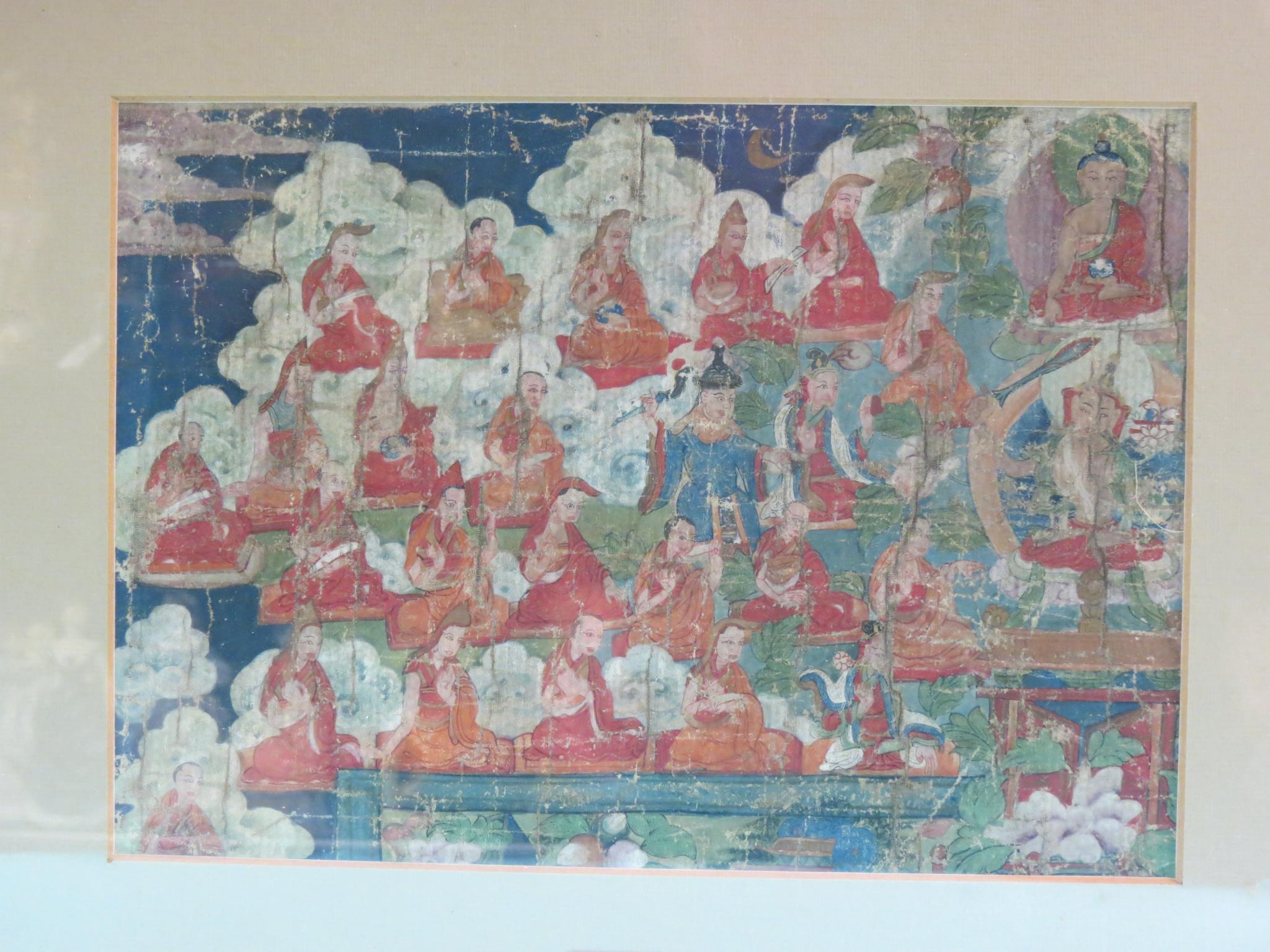 Appraisal: A Tibetan Thangka Buddhistic teacher and deities coloured pigments on