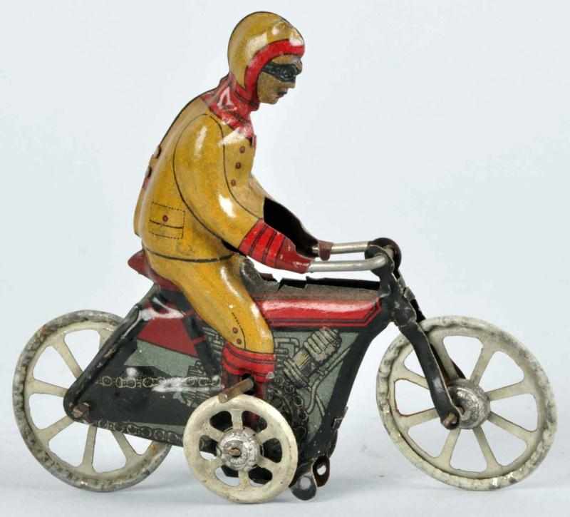 Appraisal: Tin Litho Motorcycle Penny Toy Description German Flywheel driven Missing