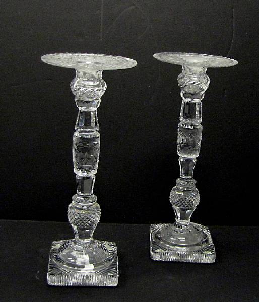 Appraisal: A pair of American cut and engraved glass candlesticks circa