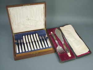 Appraisal: A set of silver dessert knives and forks with mother