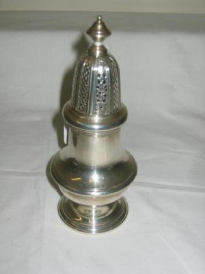 Appraisal: A CASTER of pear form with urn finial moulded girdles