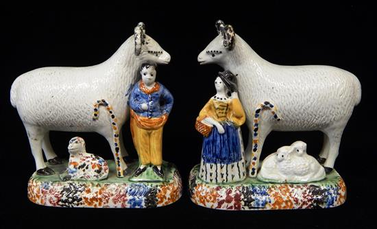 Appraisal: th C Staffordshire pair horned sheep and lamb groups with