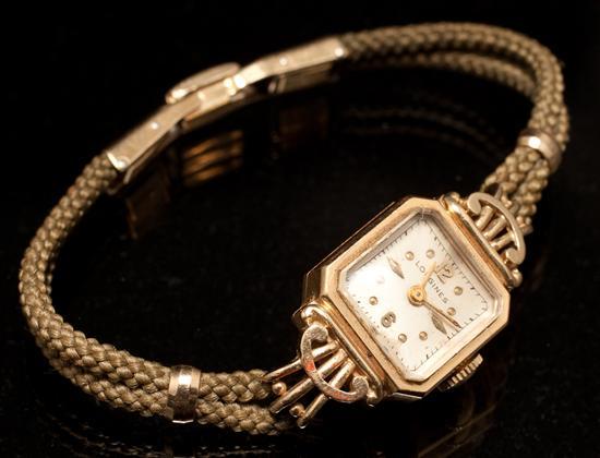 Appraisal: Longines K yellow gold case bracelet-watch