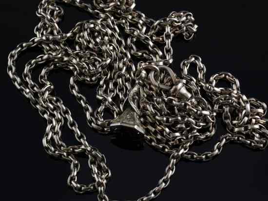 Appraisal: A ct gold guard chain with fob overall length in