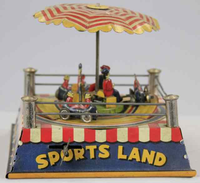 Appraisal: 'SPORTS LAND'' AMUSEMENT RIDE TOY Pre-war Japan lithographed tin elaborate