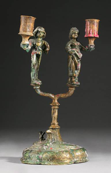 Appraisal: A Flemish bronze figural two light candelabrum th century style