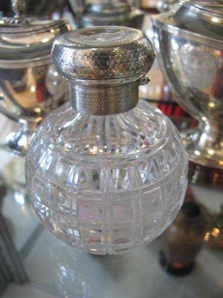 Appraisal: EDWARDIAN CUT CRYSTAL STERLING SILVER MOUNTED PERFUME BOTTLE