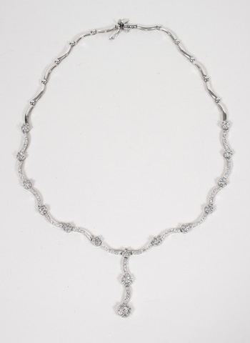 Appraisal: Lady's K white gold and diamond necklace composed of curved